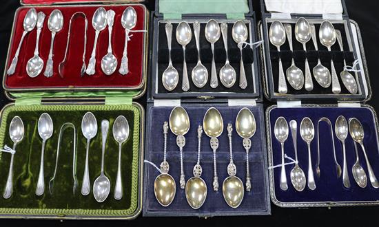 Set of six silver gilt apostle teaspoons and five other sets of tea and coffee spoons (one part, three with tongs), all cased